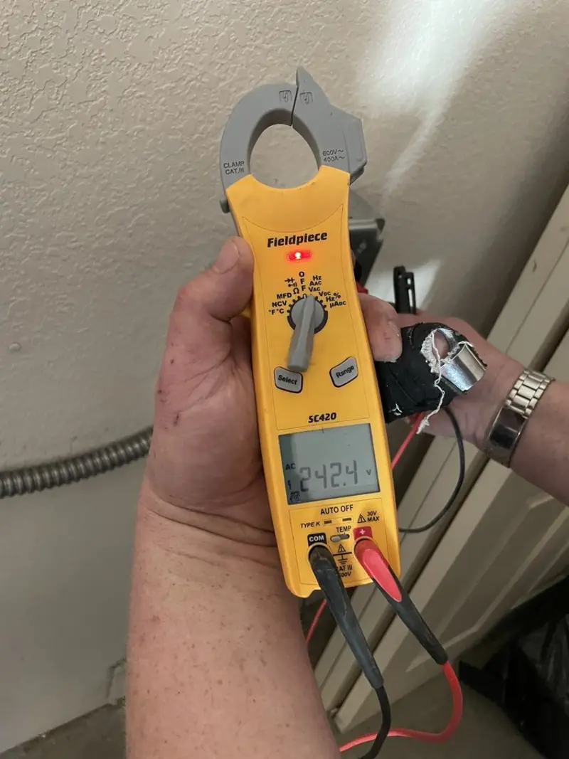 Voltage testing with clamp meter during Generator Installation in Aloha